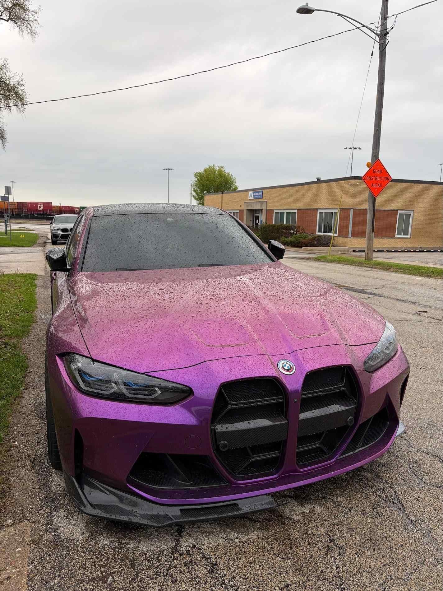 Purple G82 M4 outside the shop